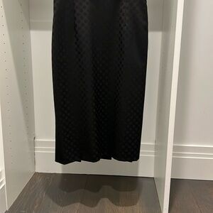 Elegant Black Midi Skirt with polka dots
